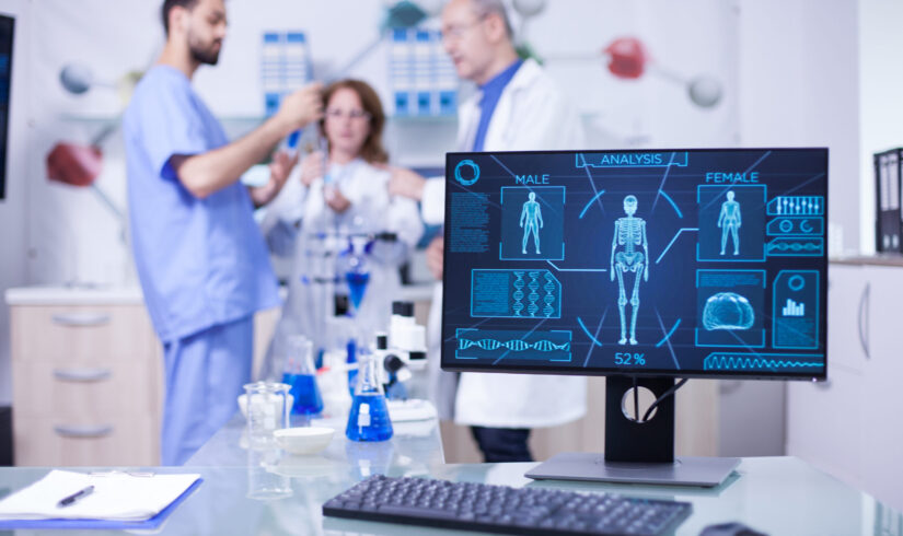 Advanced human body research displayed monitor in laborator. Researchers in human health.