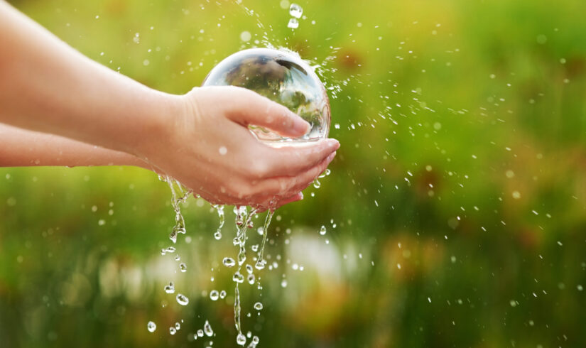 Conserving the environment is essential. Closeup shot of hands held out under a stream of water